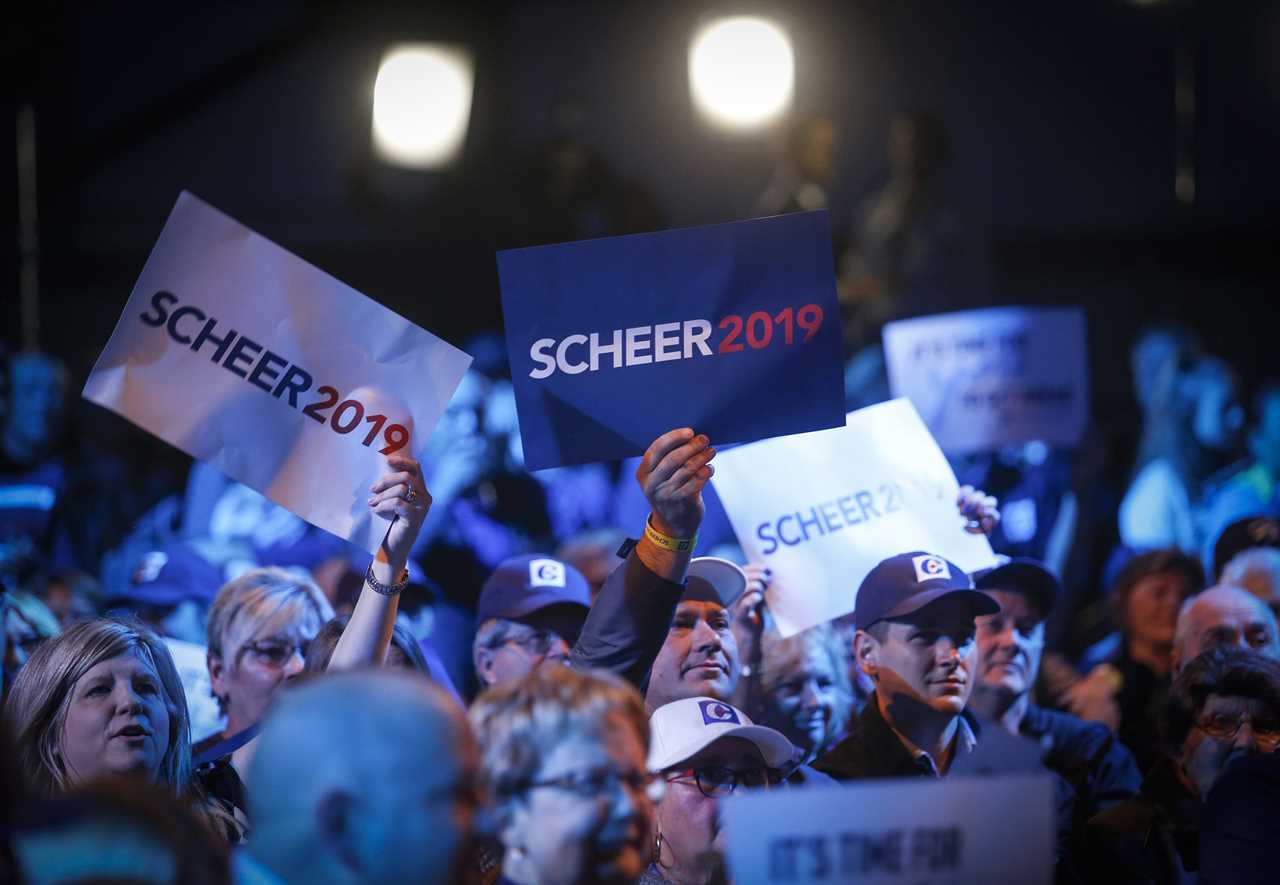 Conservative supporters react to polling results at party headquarters in Regina on Oct. 21, 2019 (Jeff McIntosh/CP)