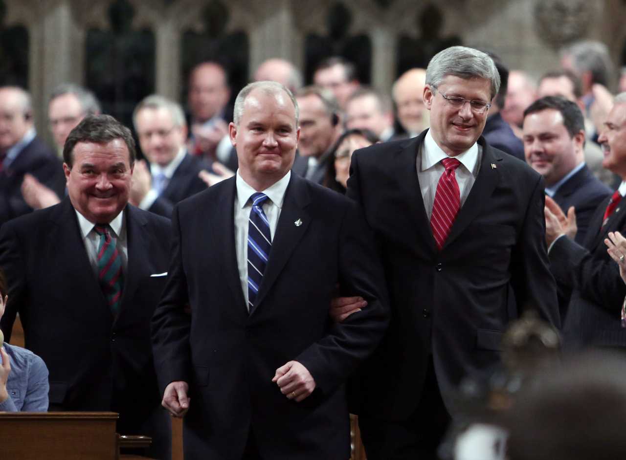 O'Toole is lead into the House of Commons by Harper before the start of Question Period on Dec. 12, 2012 (Fred Chartrand/CP)