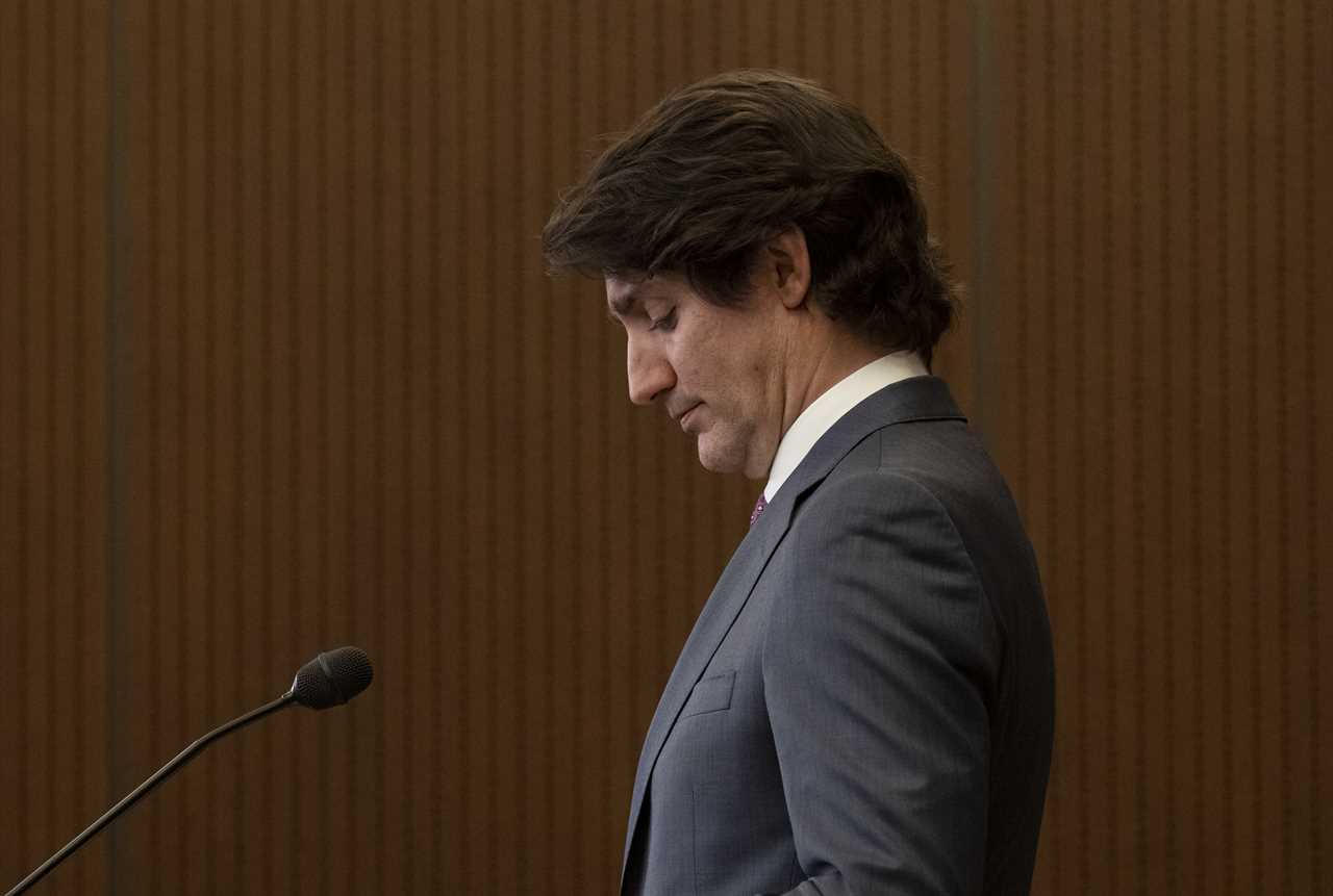 Trudeau is seen during a news conference where he announced the Emergencies Act will be invoked to deal with protests, on Feb. 14, 2022 in Ottawa (Adrian Wyld/CP)