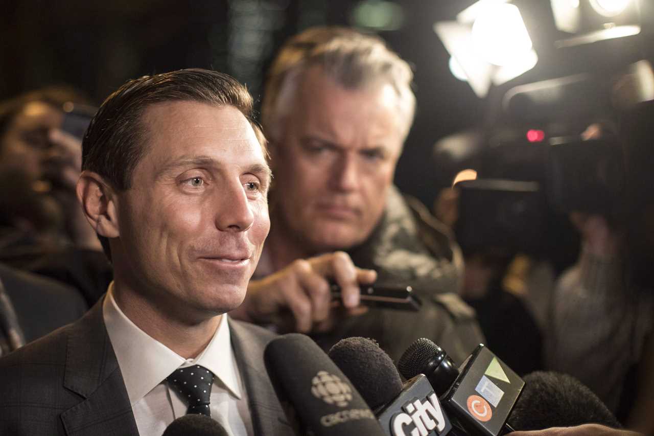 Brown leaves the Ontario PC Party Head Offices in Toronto, February 20, 2018. (Chris Young/The Canadian Press)