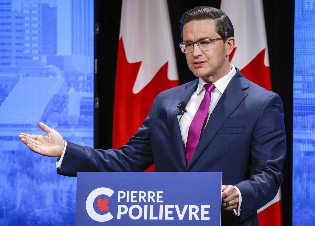 Poilievre makes a point at the Conservative Party of Canada English leadership debate in Edmonton, Alta., May 11, 2022. (Jeff McIntosh/The Canadian Press)